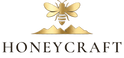 Honeycraft logo — gold bee over mountains