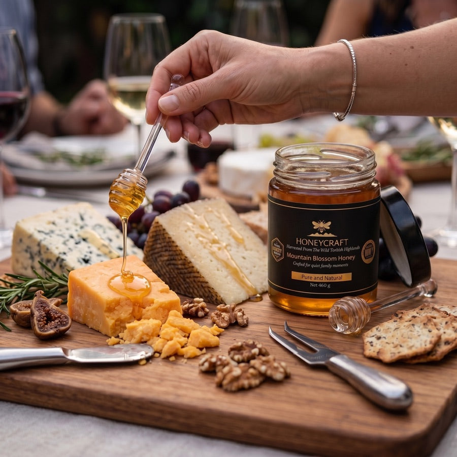 Honey drizzled over a cheese board